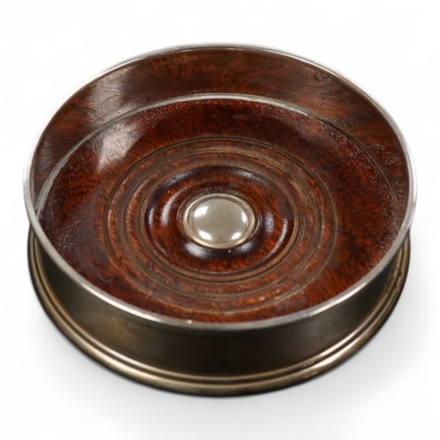 A pair of Elizabeth II silver bottle coasters diameter 13cm